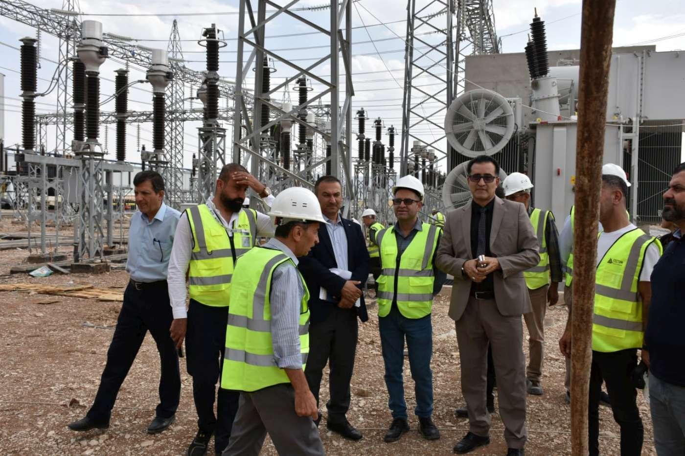 Electrical engineers working at a power facility